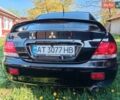 Черный Мицубиси Лансер, объемом двигателя 1.6 л и пробегом 200 тыс. км за 2300 $, фото 1 на Automoto.ua