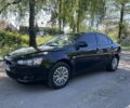 Чорний Міцубісі Lancer, об'ємом двигуна 1.5 л та пробігом 290 тис. км за 4882 $, фото 1 на Automoto.ua