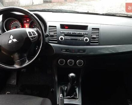 Черный Мицубиси Лансер, объемом двигателя 2 л и пробегом 63 тыс. км за 8000 $, фото 4 на Automoto.ua