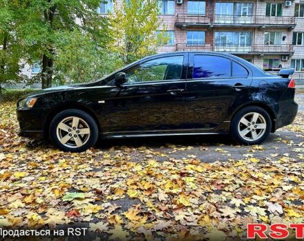 Чорний Міцубісі Lancer, об'ємом двигуна 2 л та пробігом 245 тис. км за 5500 $, фото 3 на Automoto.ua