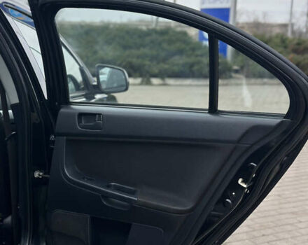Чорний Міцубісі Lancer, об'ємом двигуна 1.5 л та пробігом 111 тис. км за 6999 $, фото 50 на Automoto.ua