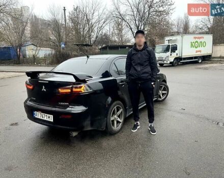 Черный Мицубиси Лансер, объемом двигателя 2 л и пробегом 217 тыс. км за 7000 $, фото 36 на Automoto.ua