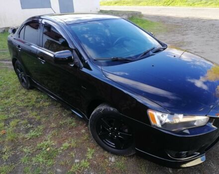 Міцубісі Lancer 2008 у Києві на Automoto.ua Чорний Міцубісі Lancer, об'ємом двигуна 2 л та пробігом 196 тис. км за 5500 $, фото 8 на Automoto.ua