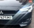 Черный Мицубиси Лансер, объемом двигателя 2 л и пробегом 217 тыс. км за 7000 $, фото 40 на Automoto.ua