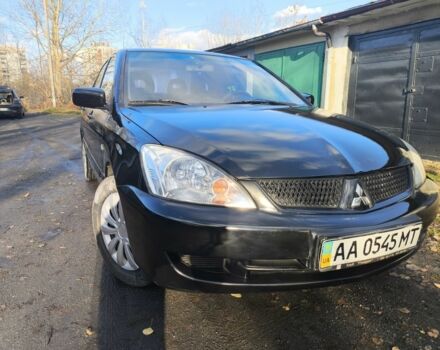 Черный Мицубиси Лансер, объемом двигателя 1.6 л и пробегом 243 тыс. км за 3200 $, фото 7 на Automoto.ua