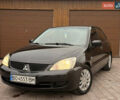 Чорний Міцубісі Lancer, об'ємом двигуна 1.6 л та пробігом 265 тис. км за 4700 $, фото 1 на Automoto.ua