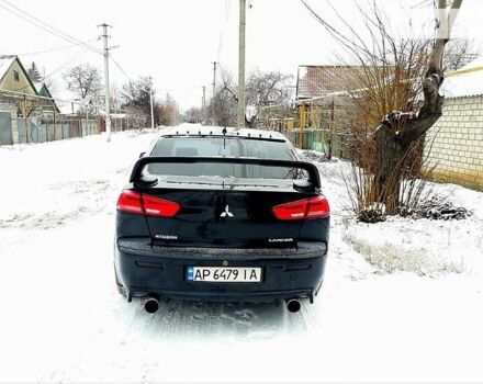 Чорний Міцубісі Lancer, об'ємом двигуна 2 л та пробігом 208 тис. км за 9500 $, фото 2 на Automoto.ua