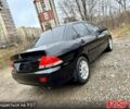 Черный Мицубиси Лансер, объемом двигателя 1.6 л и пробегом 216 тыс. км за 5190 $, фото 4 на Automoto.ua