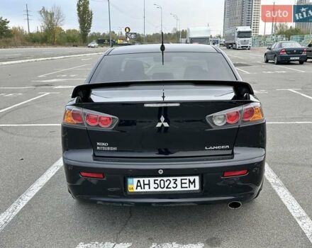 Чорний Міцубісі Lancer, об'ємом двигуна 2 л та пробігом 199 тис. км за 7900 $, фото 9 на Automoto.ua