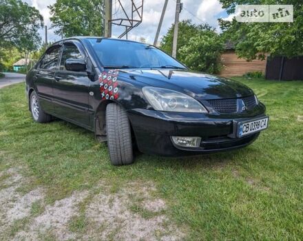 Чорний Міцубісі Lancer, об'ємом двигуна 1.6 л та пробігом 192 тис. км за 3850 $, фото 1 на Automoto.ua