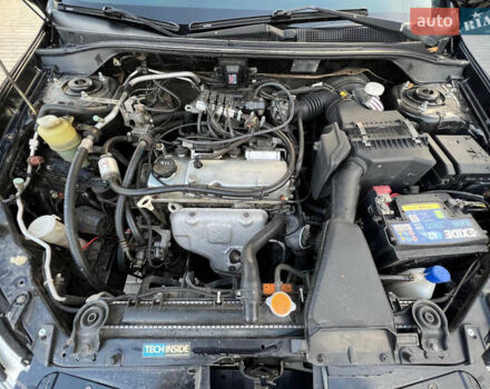 Чорний Міцубісі Lancer, об'ємом двигуна 1.58 л та пробігом 237 тис. км за 4500 $, фото 19 на Automoto.ua