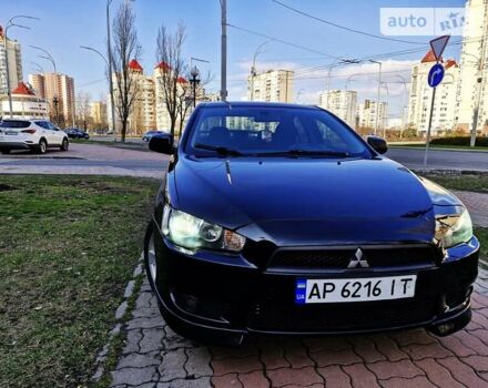 Чорний Міцубісі Lancer, об'ємом двигуна 2 л та пробігом 182 тис. км за 7650 $, фото 15 на Automoto.ua