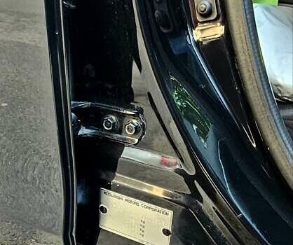 Черный Мицубиси Лансер, объемом двигателя 1.5 л и пробегом 205 тыс. км за 6300 $, фото 11 на Automoto.ua