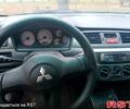 Черный Мицубиси Лансер, объемом двигателя 1.6 л и пробегом 190 тыс. км за 4500 $, фото 1 на Automoto.ua