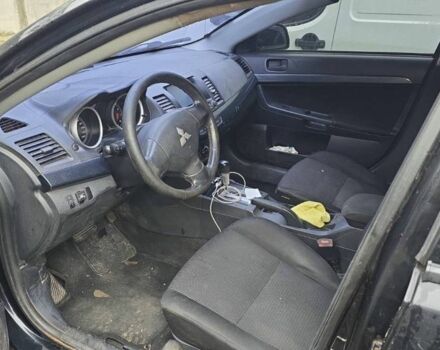 Черный Мицубиси Лансер, объемом двигателя 1.5 л и пробегом 300 тыс. км за 2500 $, фото 3 на Automoto.ua
