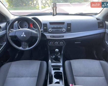 Черный Мицубиси Лансер, объемом двигателя 1.5 л и пробегом 263 тыс. км за 5300 $, фото 7 на Automoto.ua