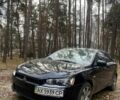 Чорний Міцубісі Lancer, об'ємом двигуна 1.5 л та пробігом 183 тис. км за 6400 $, фото 1 на Automoto.ua