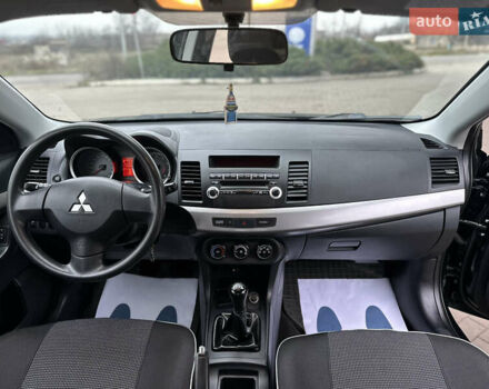 Чорний Міцубісі Lancer, об'ємом двигуна 1.5 л та пробігом 111 тис. км за 6999 $, фото 67 на Automoto.ua