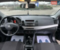 Чорний Міцубісі Lancer, об'ємом двигуна 1.5 л та пробігом 111 тис. км за 6999 $, фото 67 на Automoto.ua