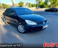 Чорний Міцубісі Lancer, об'ємом двигуна 1.6 л та пробігом 215 тис. км за 4500 $, фото 1 на Automoto.ua