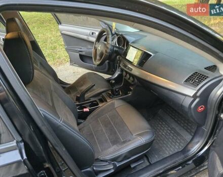 Чорний Міцубісі Lancer, об'ємом двигуна 1.5 л та пробігом 132 тис. км за 7999 $, фото 7 на Automoto.ua