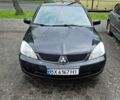 Чорний Міцубісі Lancer, об'ємом двигуна 1.6 л та пробігом 343 тис. км за 3500 $, фото 1 на Automoto.ua