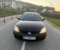 Чорний Міцубісі Lancer, об'ємом двигуна 1.6 л та пробігом 151 тис. км за 4700 $, фото 1 на Automoto.ua