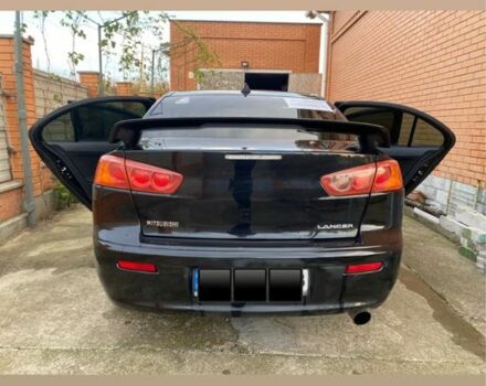 Черный Мицубиси Лансер, объемом двигателя 2 л и пробегом 140 тыс. км за 7200 $, фото 3 на Automoto.ua