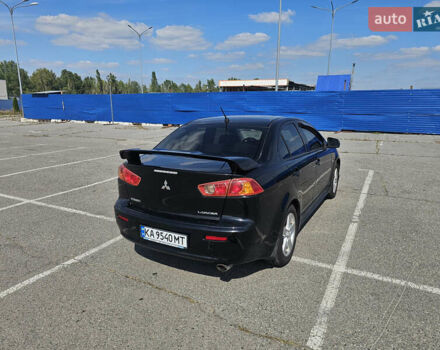 Чорний Міцубісі Lancer, об'ємом двигуна 2 л та пробігом 249 тис. км за 6500 $, фото 6 на Automoto.ua