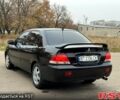 Чорний Міцубісі Lancer, об'ємом двигуна 1.6 л та пробігом 240 тис. км за 4399 $, фото 4 на Automoto.ua