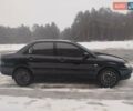 Чорний Міцубісі Lancer, об'ємом двигуна 1.6 л та пробігом 260 тис. км за 5500 $, фото 1 на Automoto.ua