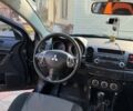 Чорний Міцубісі Lancer, об'ємом двигуна 2 л та пробігом 150 тис. км за 5500 $, фото 1 на Automoto.ua