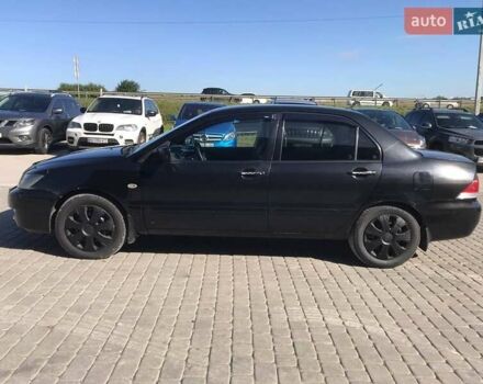 Мицубиси Лансер 2008 в Львове на Automoto.ua Черный Мицубиси Лансер, объемом двигателя 1.6 л и пробегом 356 тыс. км за 4590 $, фото 14 на Automoto.ua