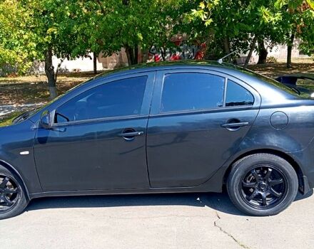 Черный Мицубиси Лансер, объемом двигателя 1.5 л и пробегом 270 тыс. км за 4400 $, фото 2 на Automoto.ua