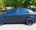 Черный Мицубиси Лансер, объемом двигателя 1.5 л и пробегом 270 тыс. км за 4400 $, фото 2 на Automoto.ua