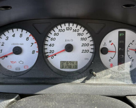 Черный Мицубиси Лансер, объемом двигателя 1.6 л и пробегом 321 тыс. км за 5000 $, фото 35 на Automoto.ua