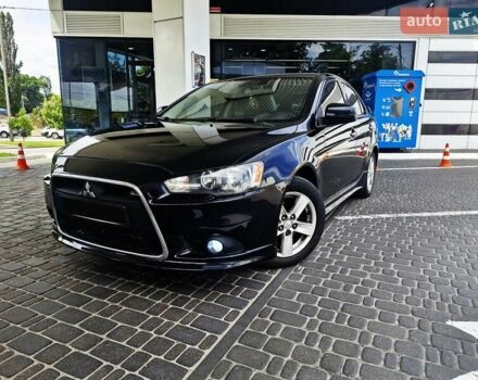 Чорний Міцубісі Lancer, об'ємом двигуна 2 л та пробігом 240 тис. км за 7850 $, фото 9 на Automoto.ua