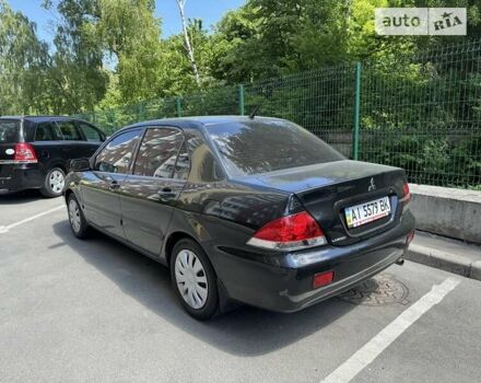 Чорний Міцубісі Lancer, об'ємом двигуна 1.6 л та пробігом 78 тис. км за 3999 $, фото 1 на Automoto.ua