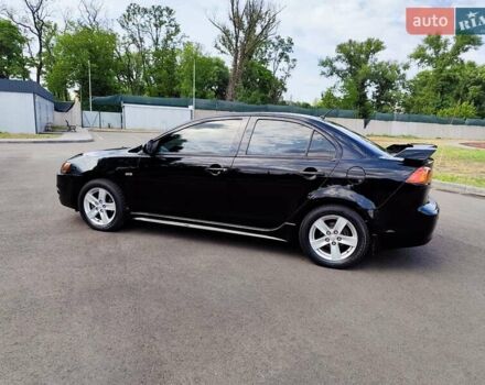 Чорний Міцубісі Lancer, об'ємом двигуна 2 л та пробігом 175 тис. км за 7800 $, фото 3 на Automoto.ua