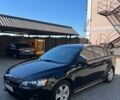 Чорний Міцубісі Lancer, об'ємом двигуна 2 л та пробігом 308 тис. км за 6700 $, фото 1 на Automoto.ua