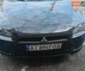 Черный Мицубиси Лансер, объемом двигателя 1.5 л и пробегом 229 тыс. км за 5000 $, фото 1 на Automoto.ua