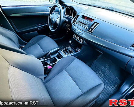 Чорний Міцубісі Lancer, об'ємом двигуна 2 л та пробігом 240 тис. км за 5900 $, фото 11 на Automoto.ua