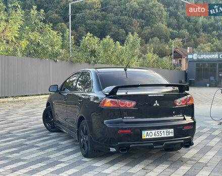 Чорний Міцубісі Lancer, об'ємом двигуна 2 л та пробігом 300 тис. км за 4600 $, фото 6 на Automoto.ua