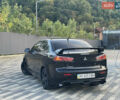 Чорний Міцубісі Lancer, об'ємом двигуна 2 л та пробігом 300 тис. км за 4600 $, фото 6 на Automoto.ua