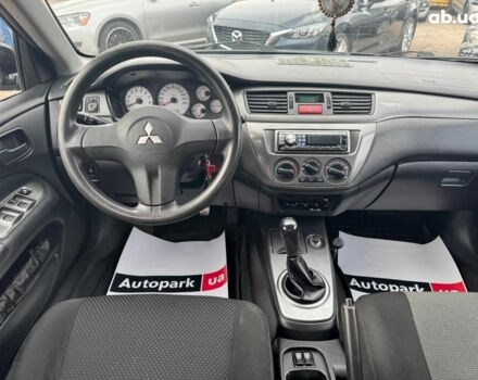 Мицубиси Лансер 2008 в Запорожье на Automoto.ua Черный Мицубиси Лансер, объемом двигателя 1.6 л и пробегом 316 тыс. км за 4290 $, фото 8 на Automoto.ua