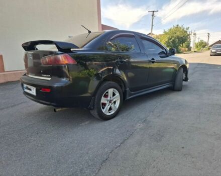 Чорний Міцубісі Lancer, об'ємом двигуна 2 л та пробігом 230 тис. км за 6650 $, фото 3 на Automoto.ua