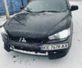 Черный Мицубиси Лансер, объемом двигателя 1.5 л и пробегом 220 тыс. км за 6019 $, фото 1 на Automoto.ua