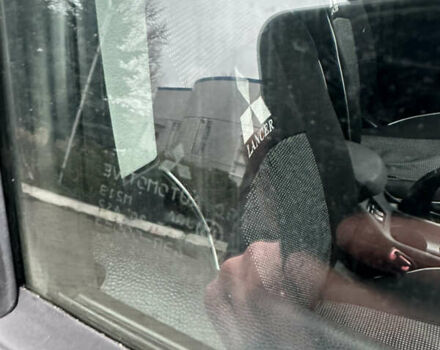 Чорний Міцубісі Lancer, об'ємом двигуна 1.5 л та пробігом 111 тис. км за 6999 $, фото 33 на Automoto.ua