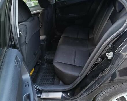 Черный Мицубиси Лансер, объемом двигателя 1.5 л и пробегом 167 тыс. км за 5500 $, фото 4 на Automoto.ua