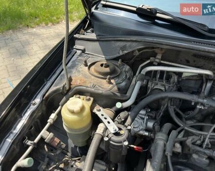 Чорний Міцубісі Lancer, об'ємом двигуна 1.6 л та пробігом 296 тис. км за 4200 $, фото 9 на Automoto.ua